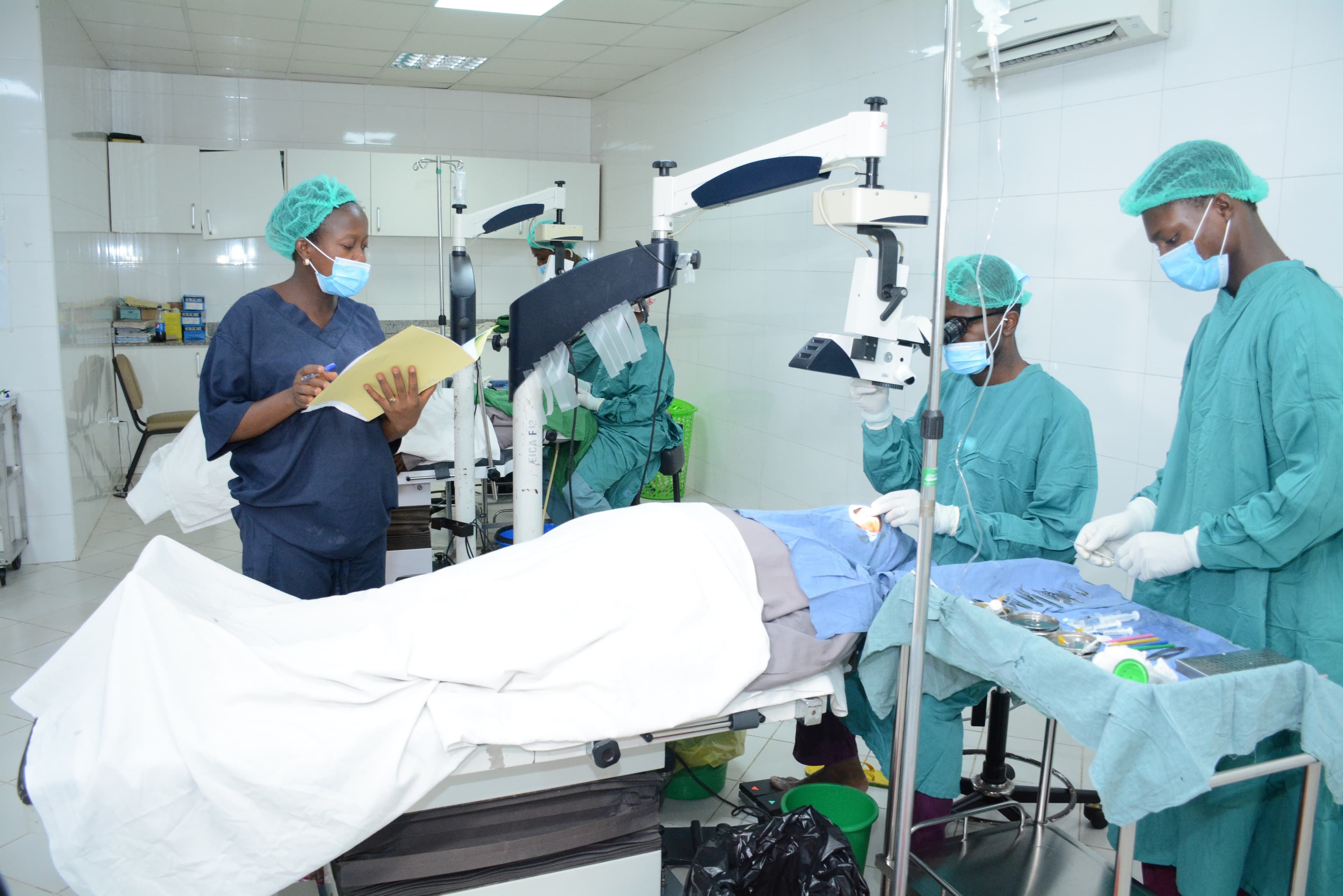 A surgeon performs a routine cataract surgery